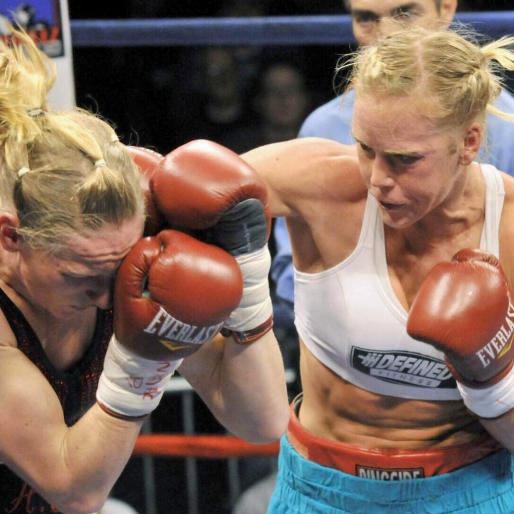 Discover Holly Holm's journey from boxing champion to UFC icon. Explore her record-breaking achievements, recent boxing return, and Holly Holm net worth estimated at $4 million in 2026.